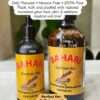 Cold pressed castor oil bottle beside natural beauty ingredients for women wellness and hair care